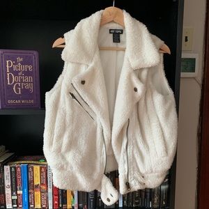 White fluffy faux fur vest.